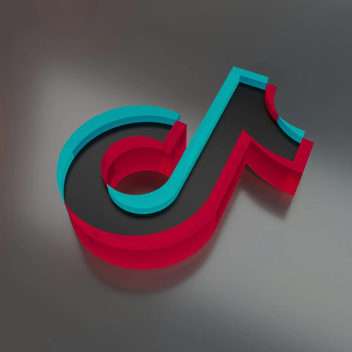 Biểu tượng TikTok ba chiều màu xanh đỏ trên nền xám